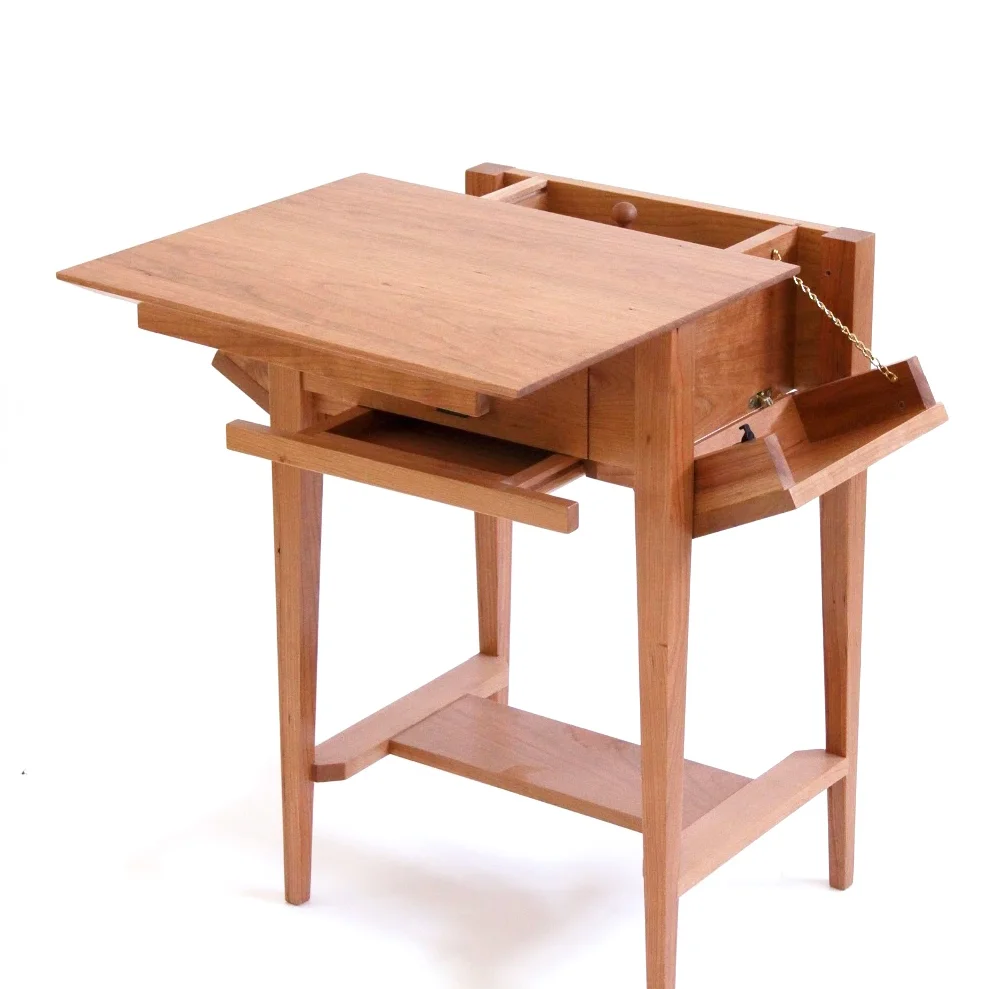 Table with hidden compartments