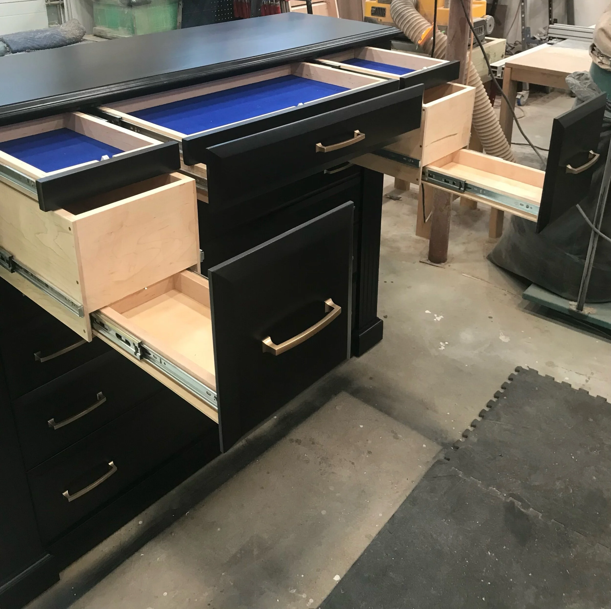 Hidden gun dresser with secret storage compartments for valuables and personal protection.