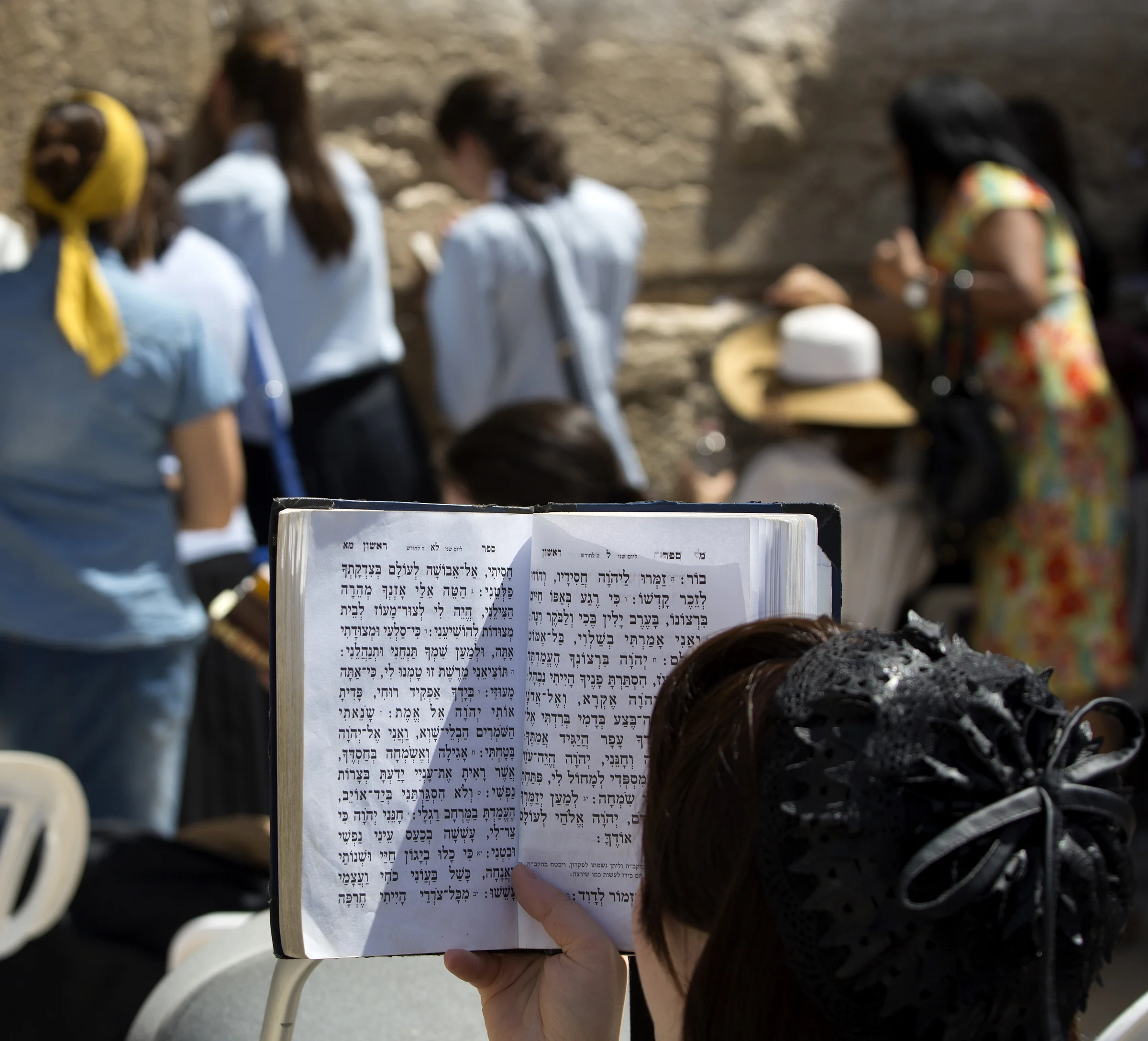 Women pray at Jerusalem's Western Wall.