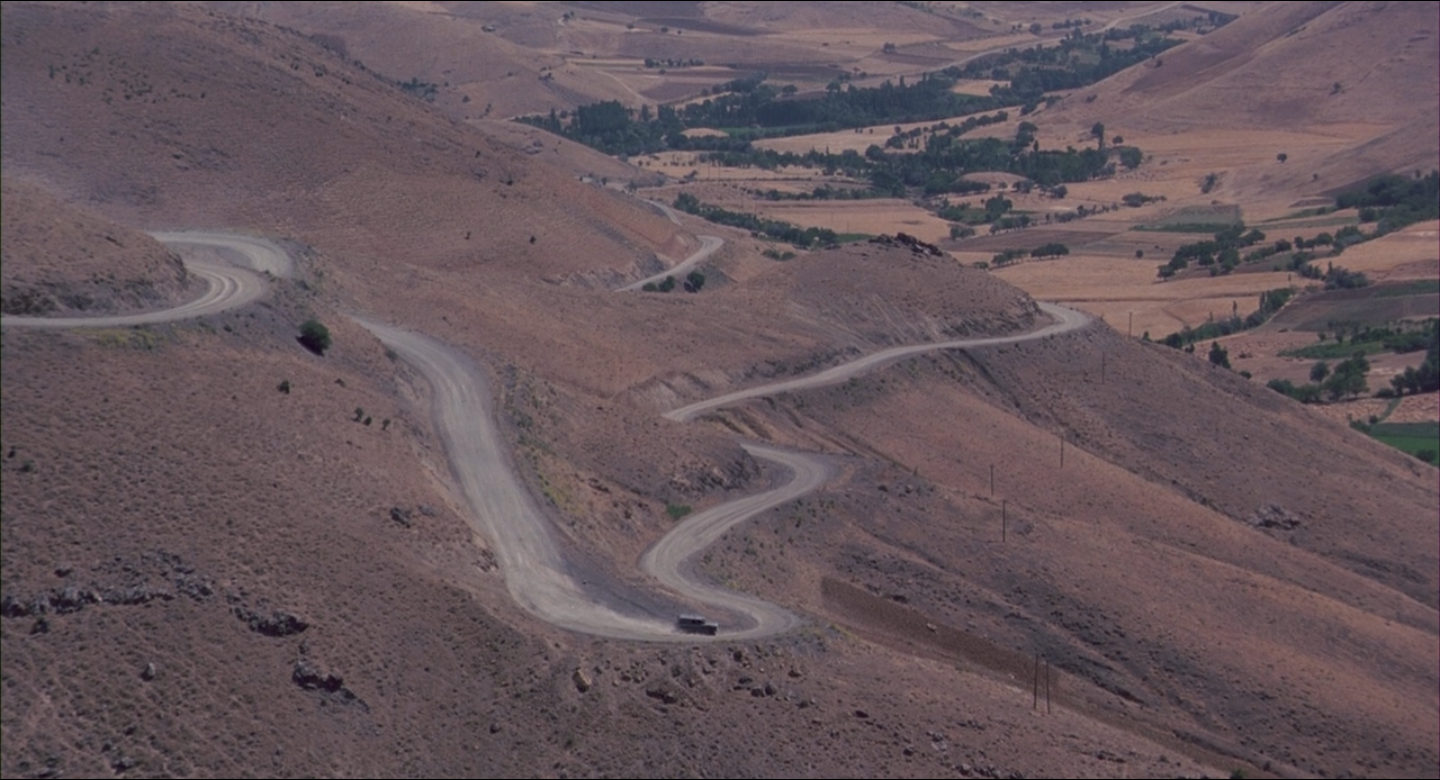 Fig. 1: The opening shot of The Wind Will Carry Us .
