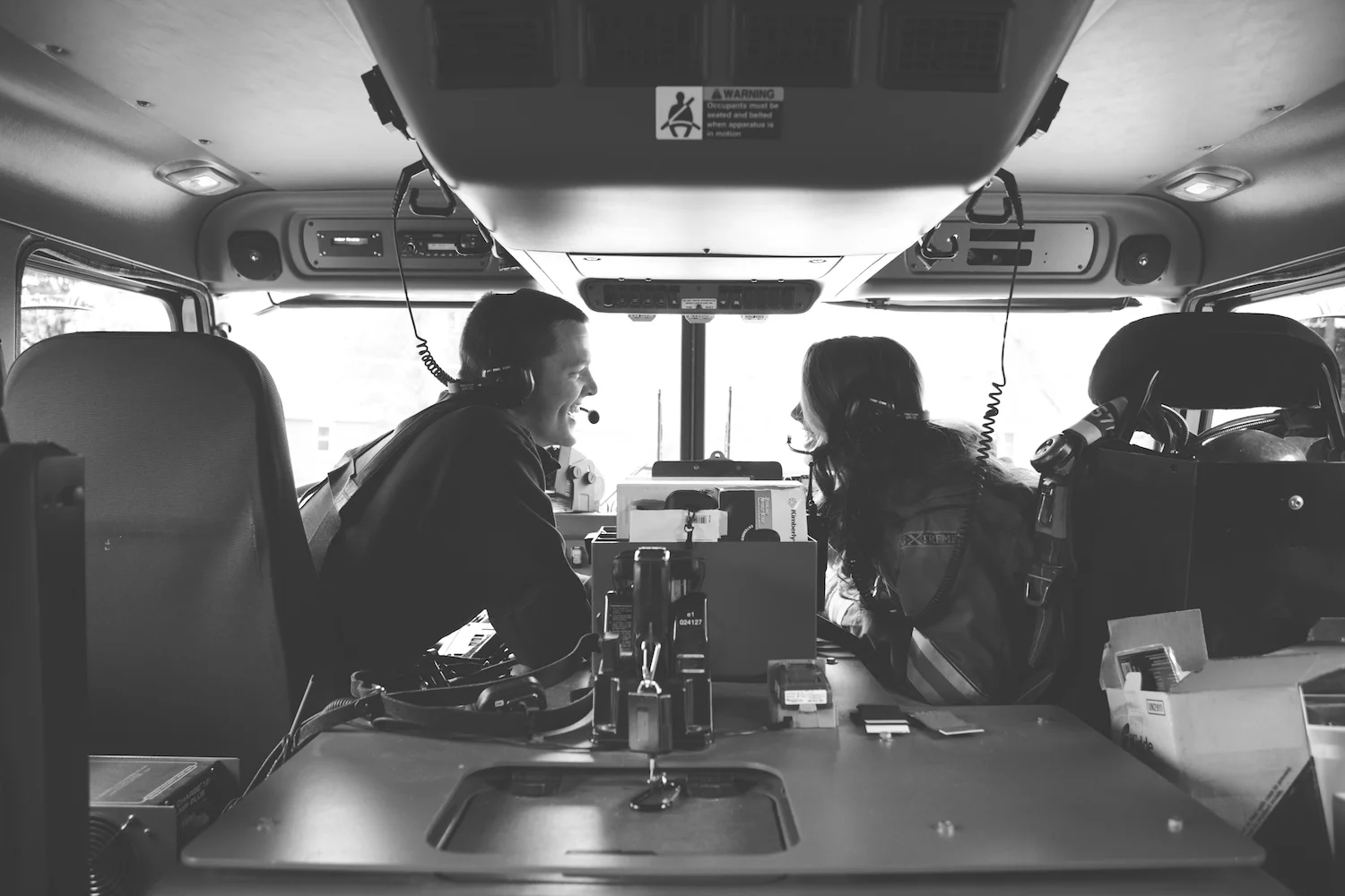 Iowa Fire Station in Windsor Heights. Engagement session at the fire station with a fire fighter.
