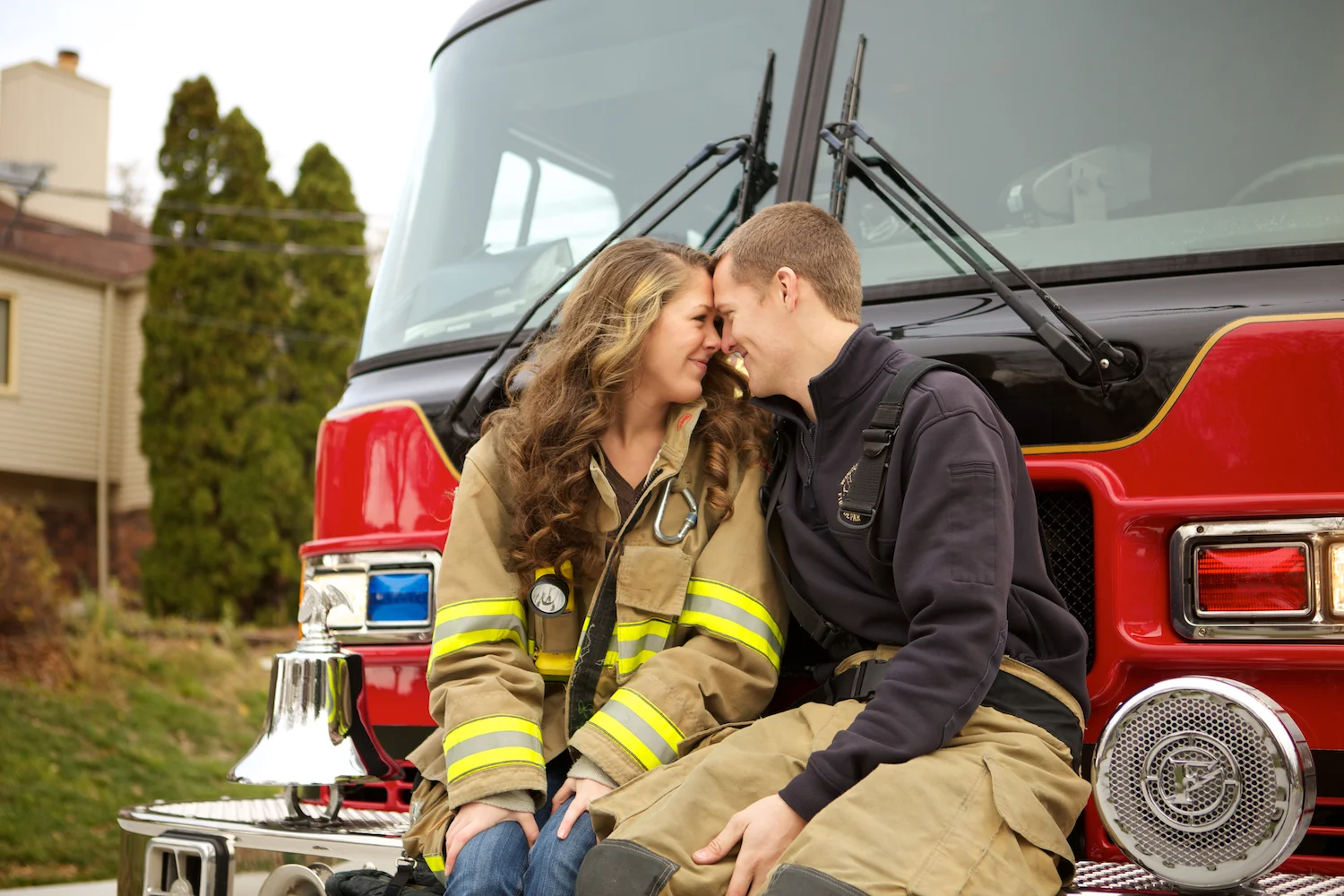I owa Fire Station in Windsor Heights. Engagement session at the fire station with a fire fighter.