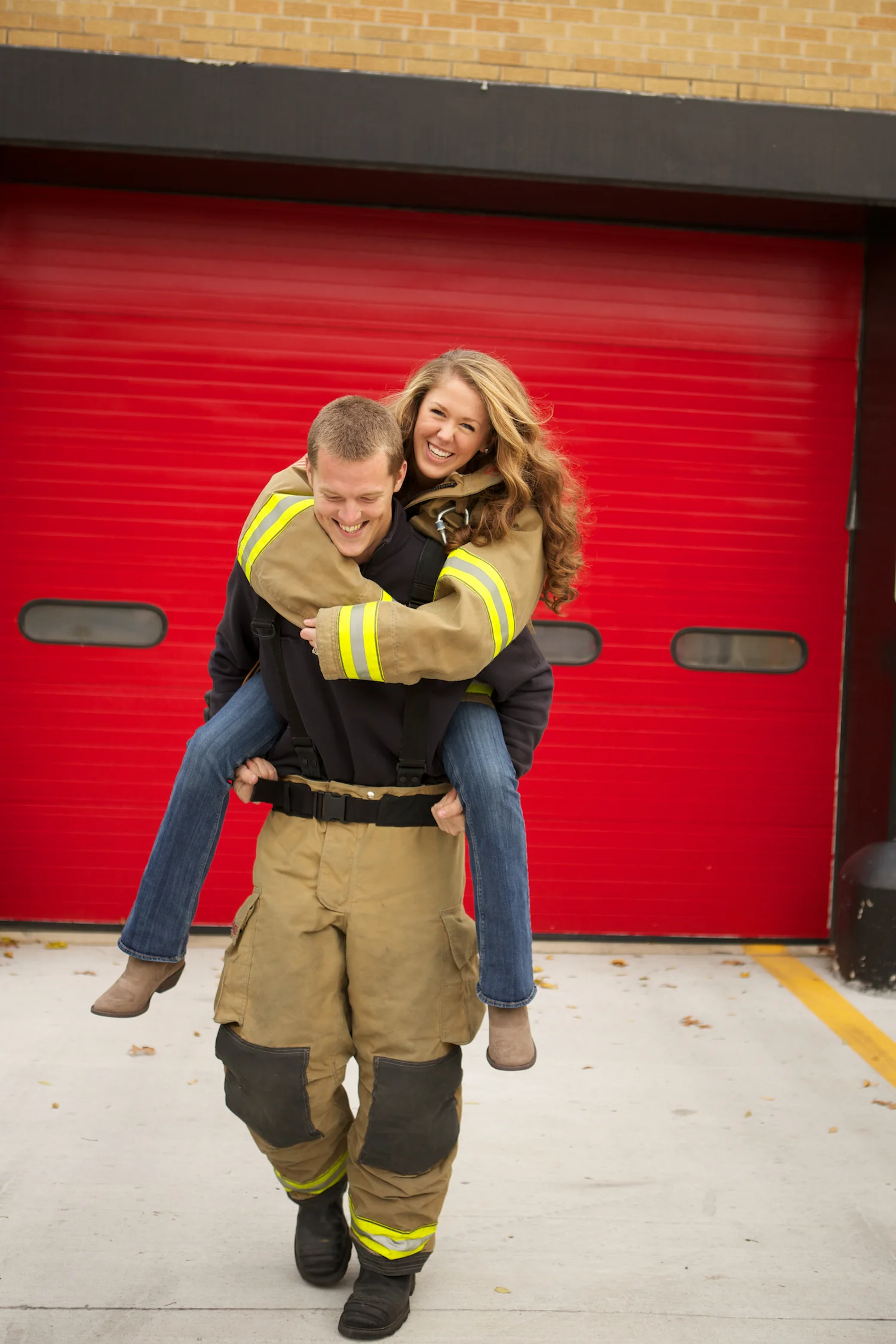 I owa Fire Station in Windsor Heights. Engagement session at the fire station with a fire fighter.