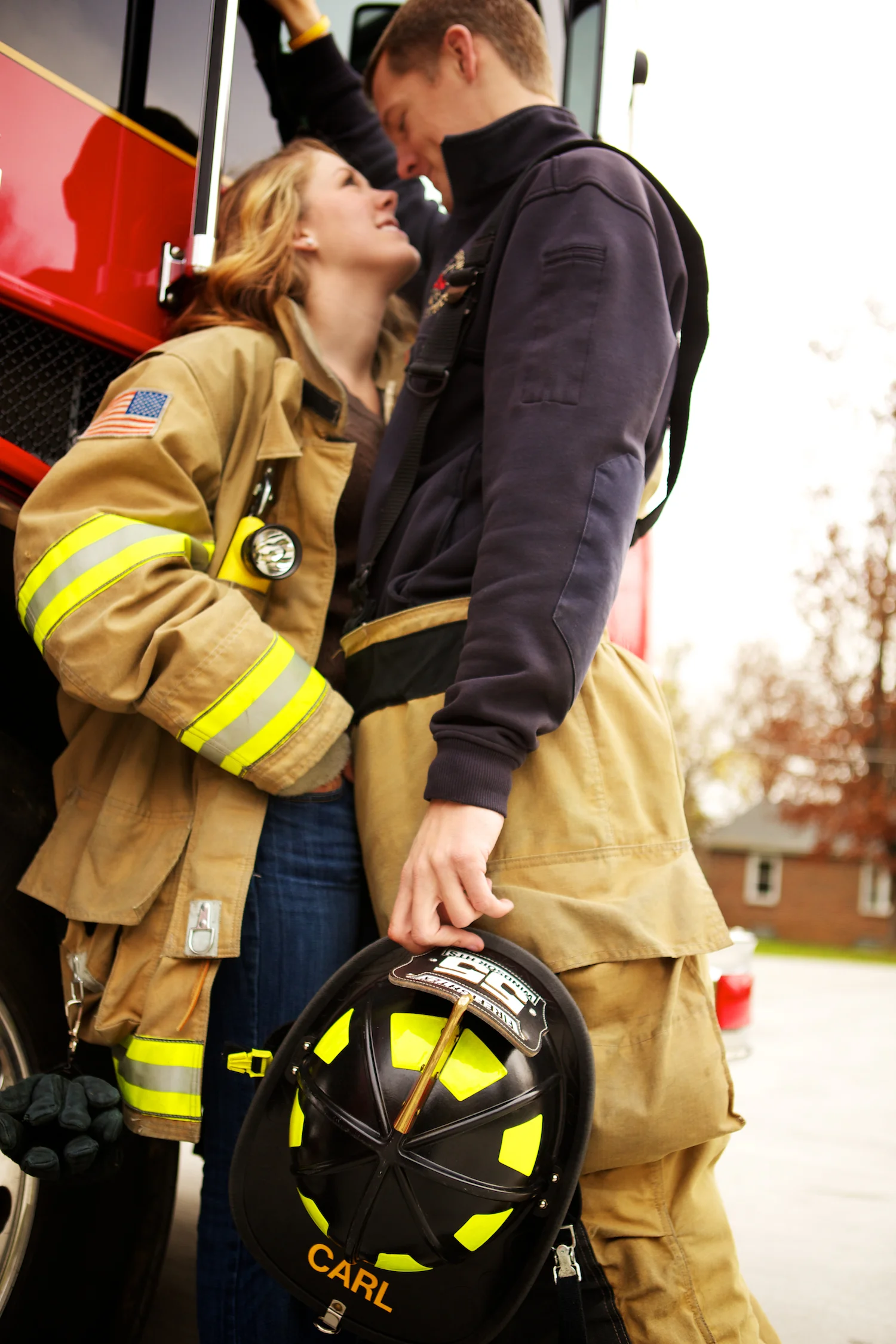 I owa Fire Station in Windsor Heights. Engagement session at the fire station with a fire fighter.