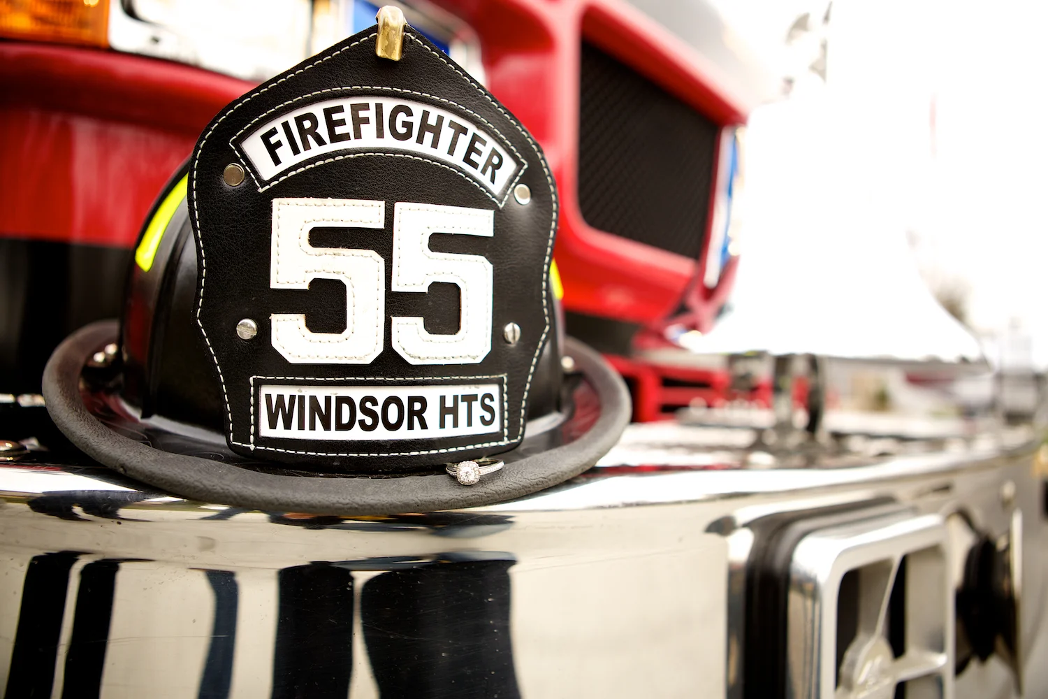 I owa Fire Station in Windsor Heights. Engagement session at the fire station with a fire fighter.