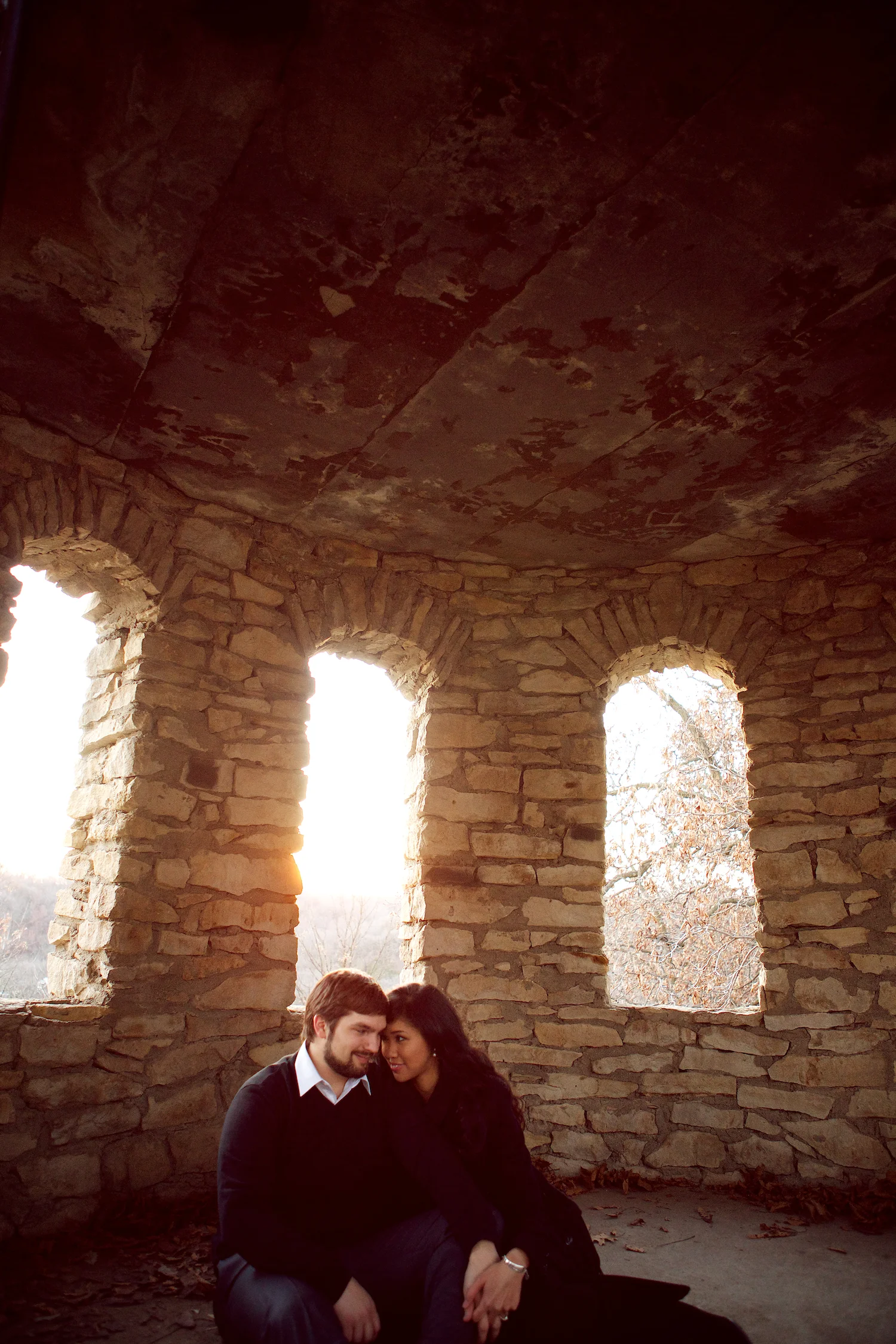 t ire swing, Winterset, Iowa, farm, bridge, hedge maze, chess, chess set, adventure, props, castle, playing chess, engagement session