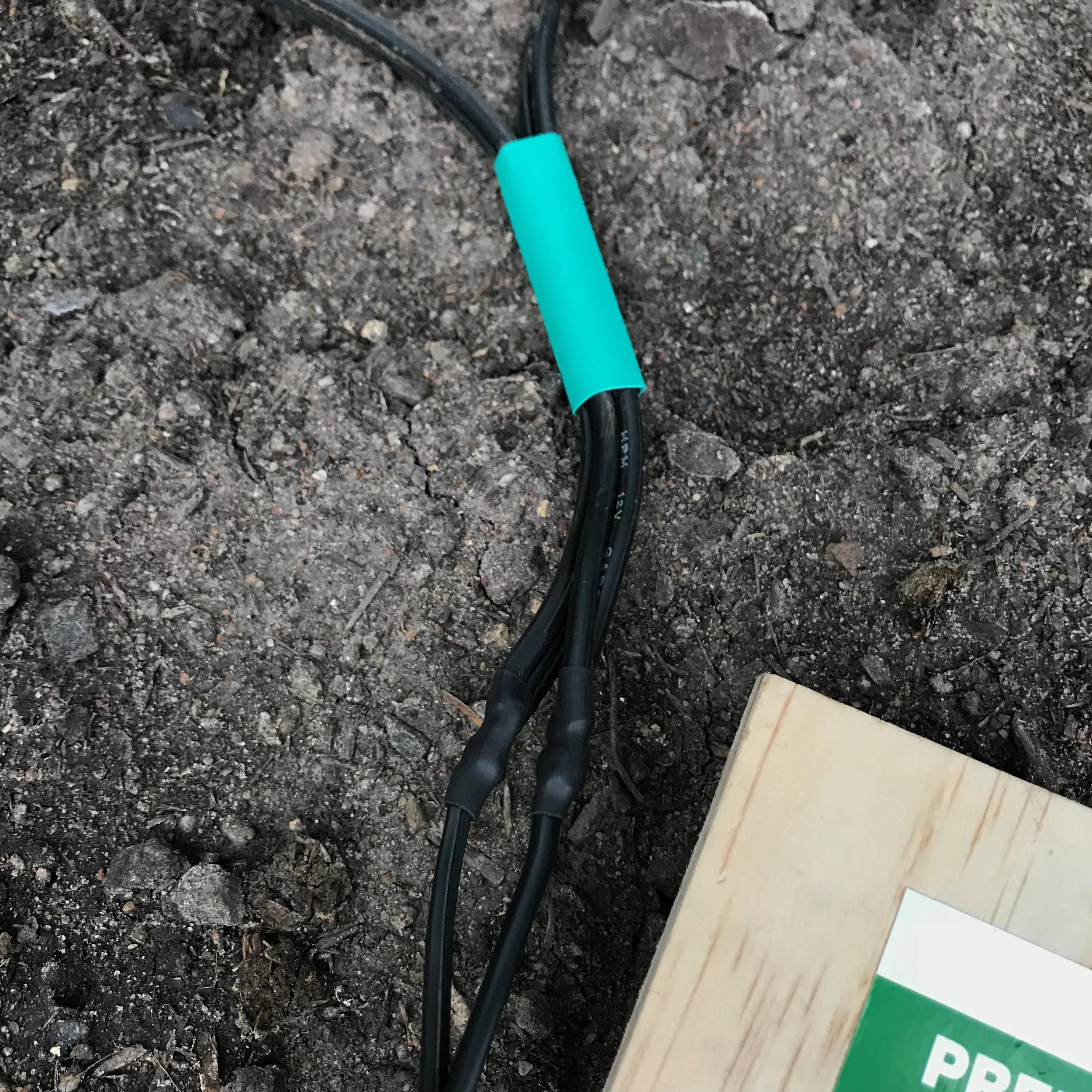 The larger green heatshrink tubing for extra protection to go over the smaller black heatshrink tubing.