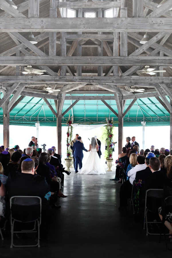 The ceremony was held in a pavilion right on the inner harbor in Baltimore. It was so peaceful and happy. Brightly colored sailboats glided by throughout the ceremony. 