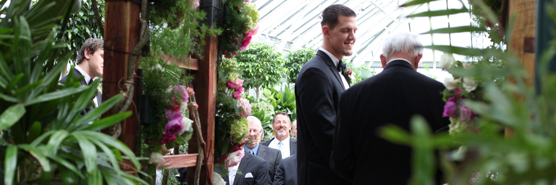 See the man smiling in the background? That's the Father of the Groom. Isn't he the happiest man that you've ever seen!?