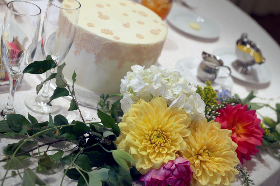 This is their cake at the sweetheart table. &nbsp;The cake and cupcakes were made by Kissed Cupcakes. They served cupcakes to the guests. &nbsp;They were out of this world! I took mine home, &nbsp;(I have a family of four) &nbsp;We all took one bite…