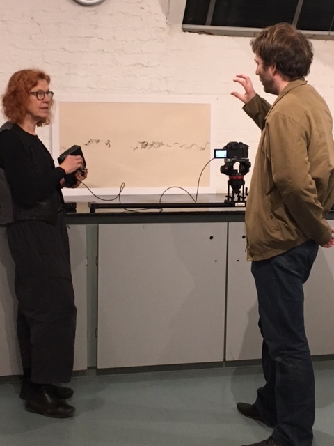 Deborah May discussing the final shot of the day.