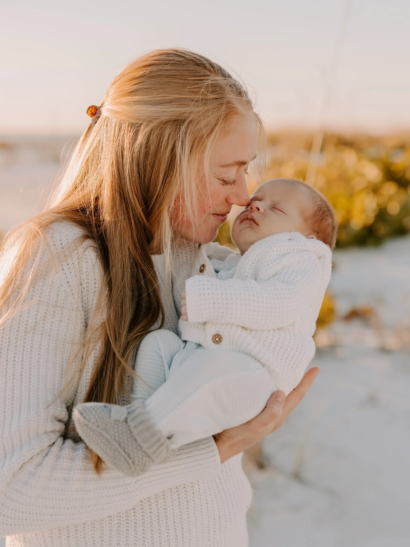 a very chilly newborn session on the beach - this family could not be more precious!