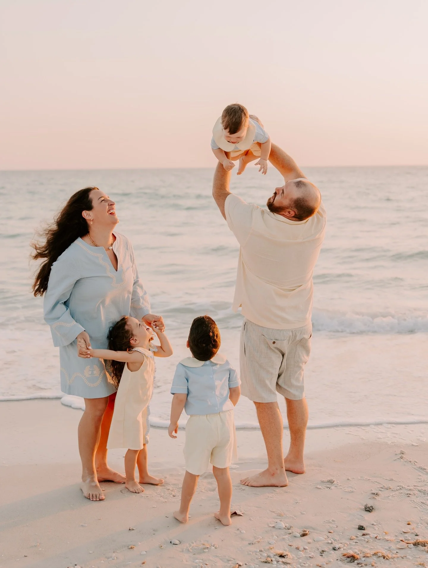 a fun and playful family session on the beach 🤍