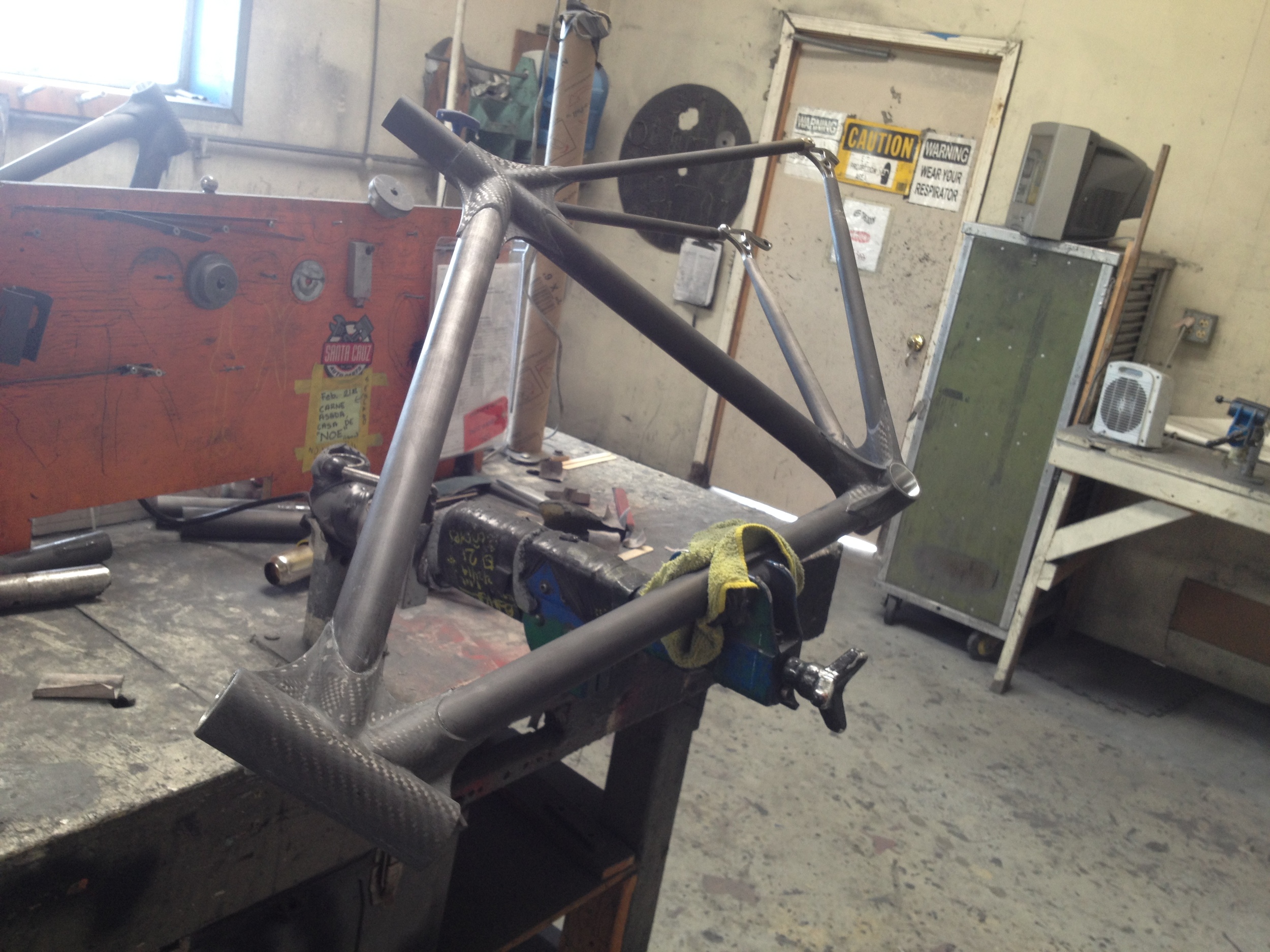The metal parts in the bottom bracket, head tube and drop-outs are made on-site in the machine shop.
