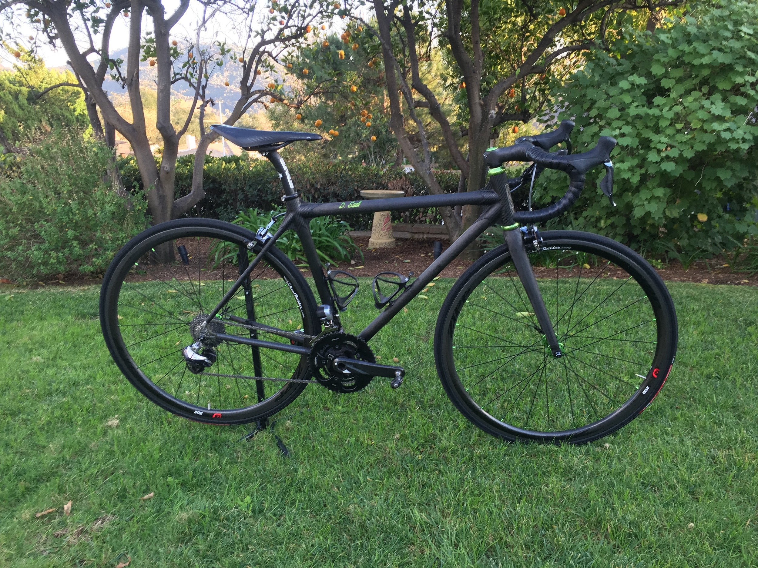 Calfee custom Dragonfly frame, enve bar, stem and post, Dura Ace Di2 11 speed, Zipp 202's, Quarq Elsa compact crank, Chris King Sour Apple hubs, bottom bracket and headset.
