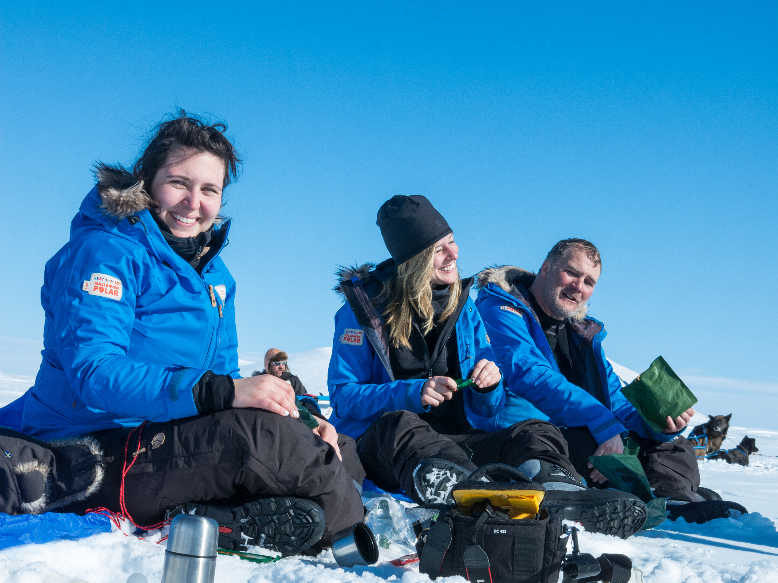 I soak up some sun during a brief lunch break with teammates Hana Chatila (Sweden) and Greg Lindstrom (USA). (Photo by Madeleine Hanssen. All rights reserved.)