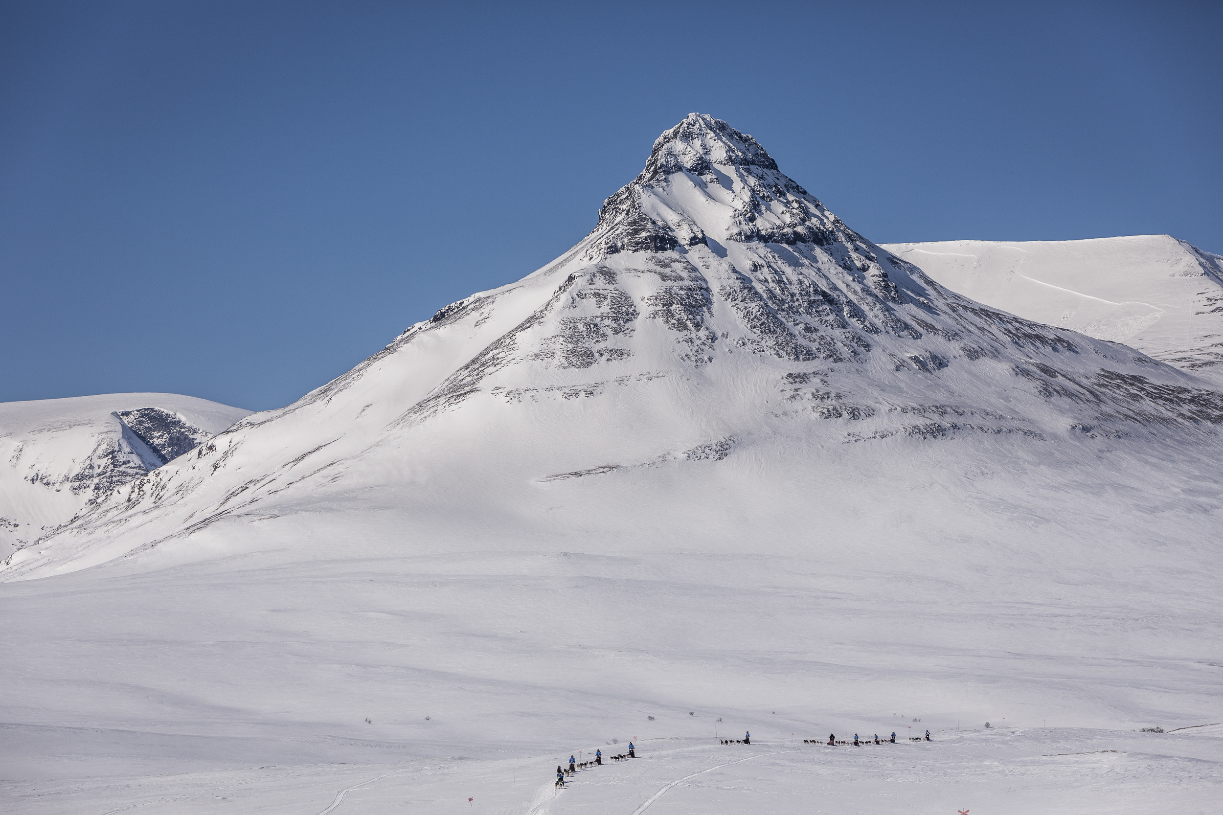 Out in the great white expanse of the subarctic tundra, it's hard not to reflect on how small and insignificant we are in the greater scheme of the universe. (Photo by Håkan Wike for Fjällräven International. All rights reserved.)
