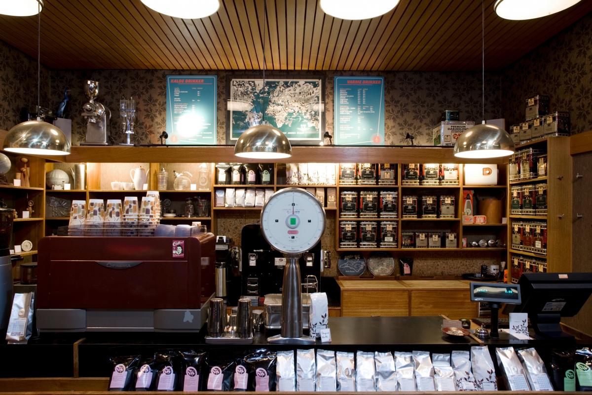 Fuglen ("The Bird") in Oslo is a coffee shop by day and cocktail lounge by night. It also serves as a gallery of Norwegian design icons, where furnishings are available for purchase. (Image via Fuglen .)