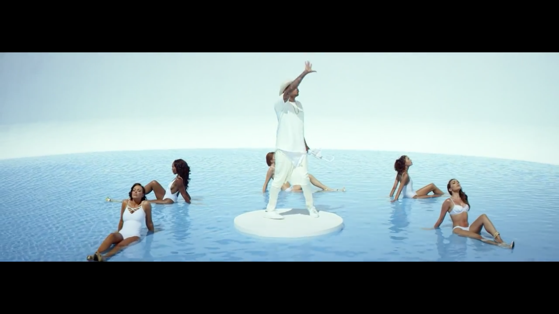 chris brown surrounded by girls new flame.jpg