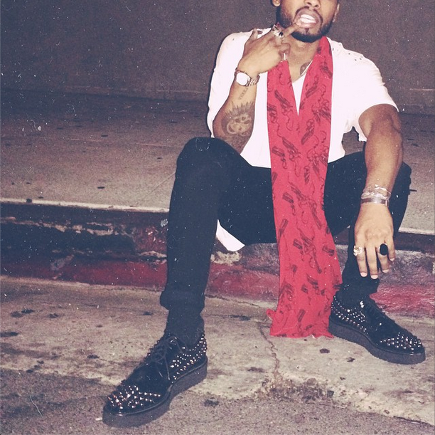 miguel looking amazing on his birthday in a red scarf.jpg