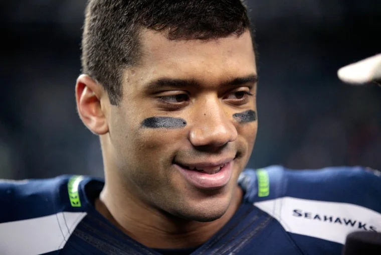 russell wilson looking gorgeous to the right.jpg