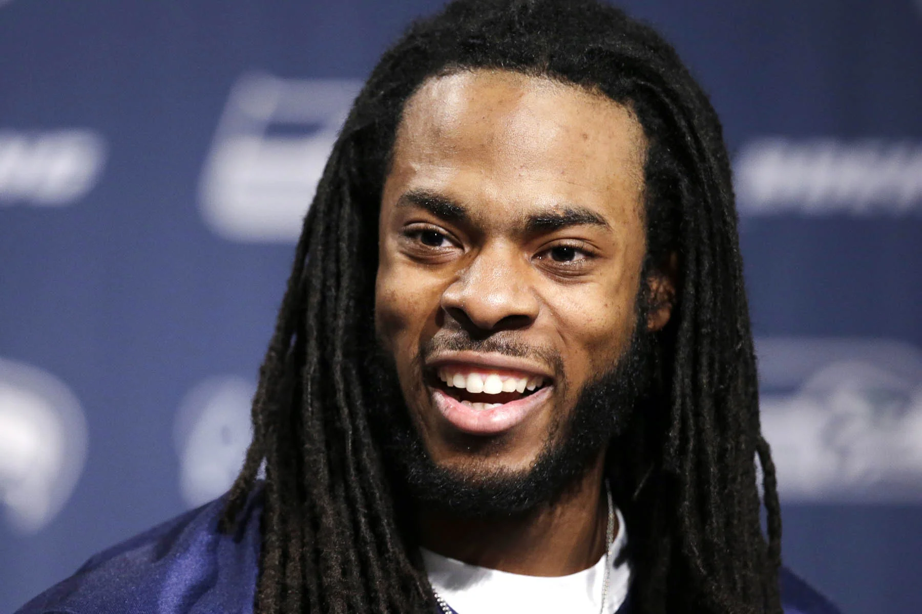 richard sherman smiling looking hot.jpg