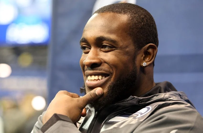 Kam Chancellor smiling because he's hot.jpg