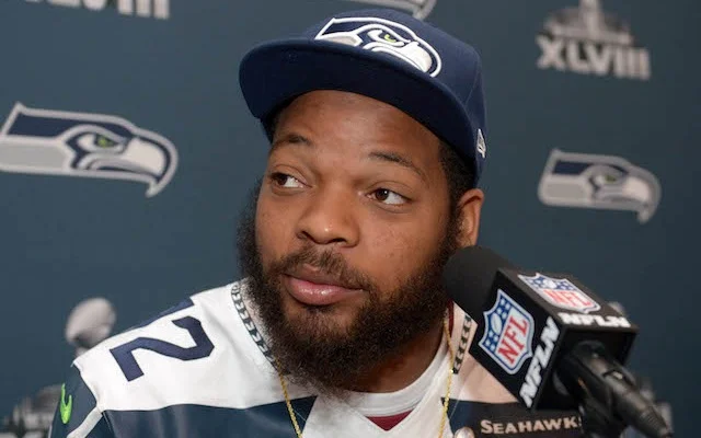 Michael Bennett looking hot with the microphone in his face.jpg