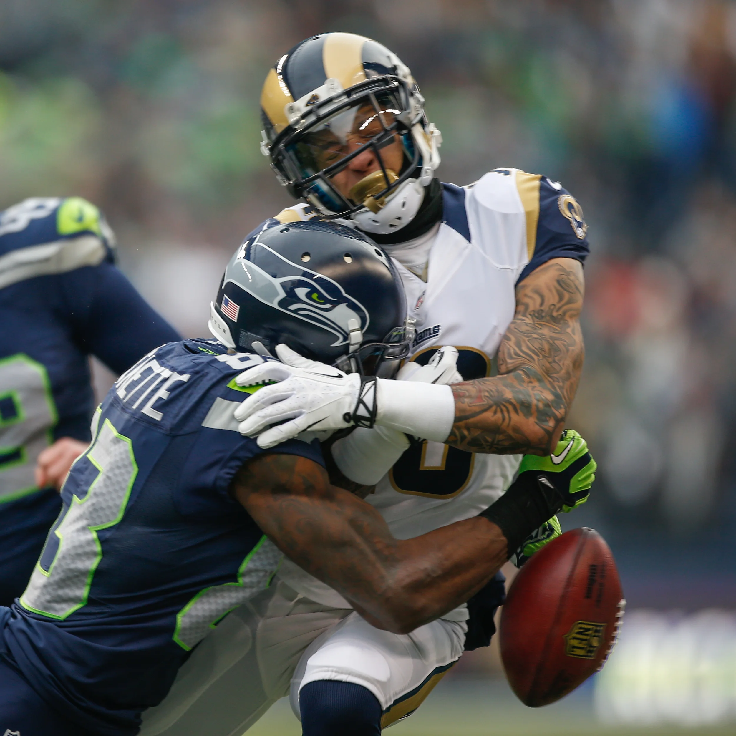 Ricardo Lockette hitting hard on the field and looking hot while doing so.jpg