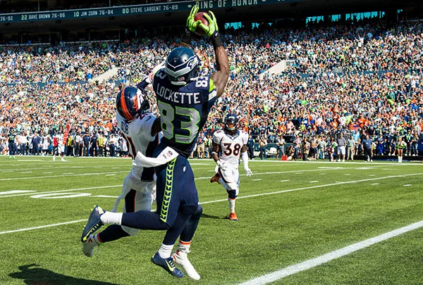 Ricardo Lockette owning some unimportant player on the broncos.jpg