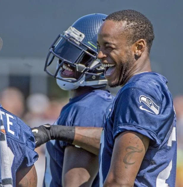 Tharold Simon having a great time on the field during practice.jpg