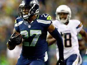 Tharold Simon running with the ball and looking hot.jpg