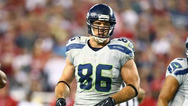 Zach Miller looking hot in white on the field.jpg