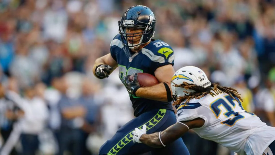 Zach Miller running with the ball.jpg