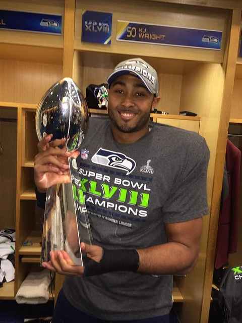 K.J. Wright with the Super Bowl trophy.jpg