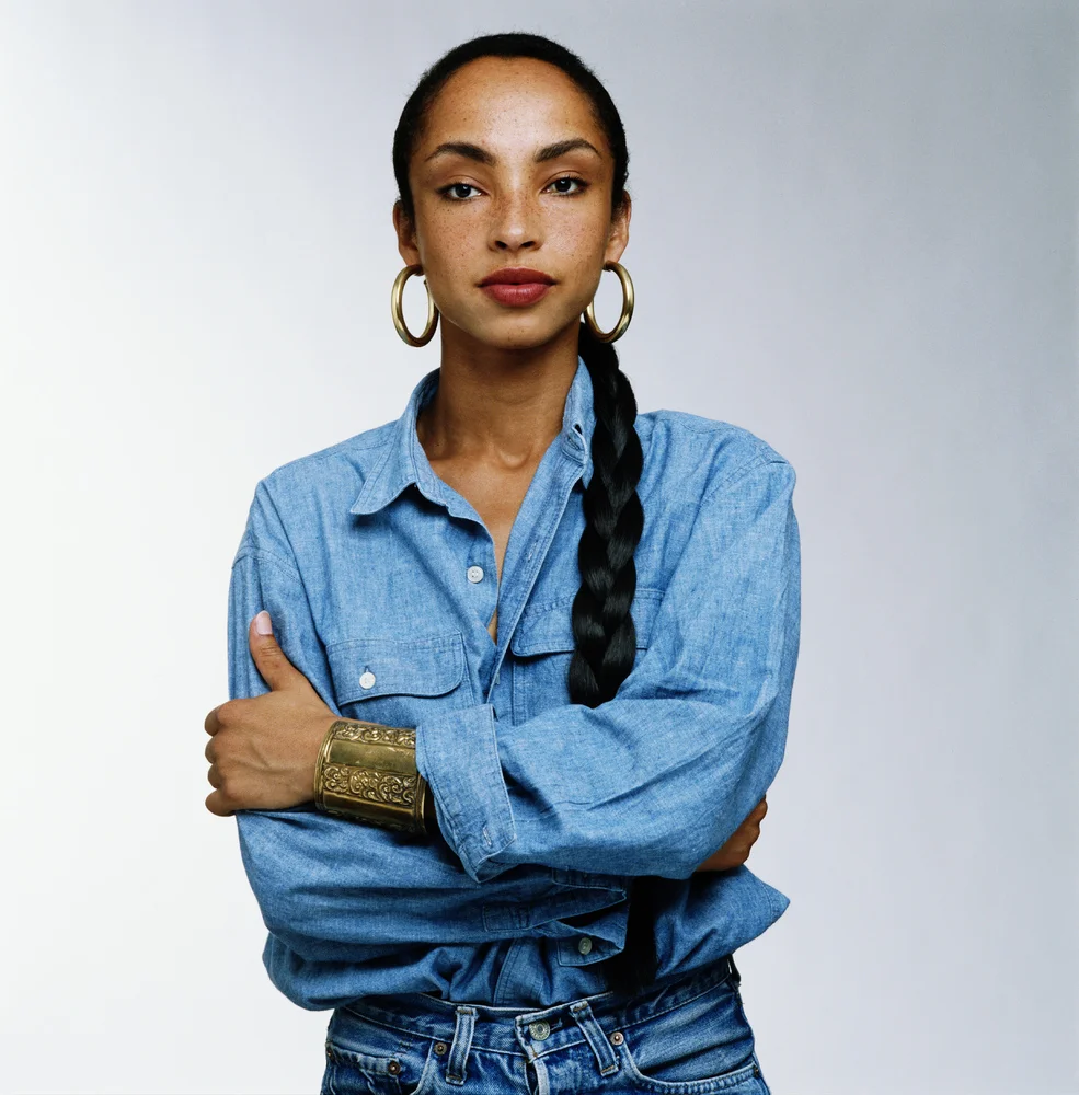Sadé in a denim button down shirt.jpg