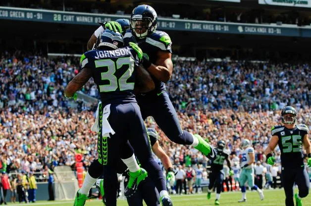 Jeron Johnson celebrating a touchdown and for being hot.jpg