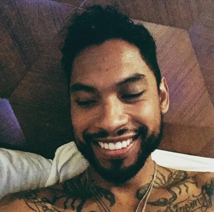 Miguel naked in bed looking hot with his perfect smile omfg I'm done.jpg