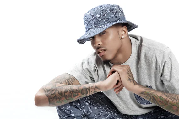 August Alsina in a bucket hat looking hot.jpg