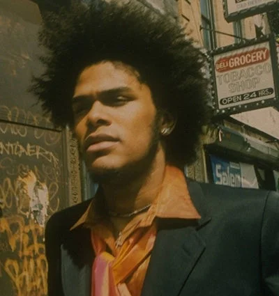 Maxwell with huge hair and looking hot.jpg