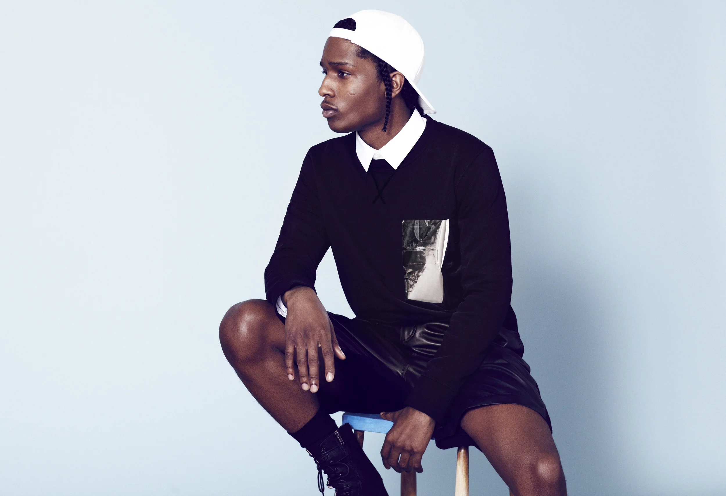 A$AP Rocky sitting pretty and looking hot with his gorgeous legs.jpg