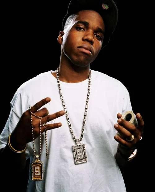 Currensy looking gorgeous in a white tee.jpg