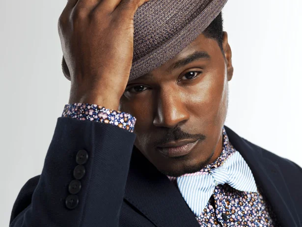 Glenn Lewis looking really hot and serious in a fedora.jpg