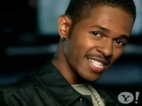 Jesse Powell with an earring and his hot smile.jpg