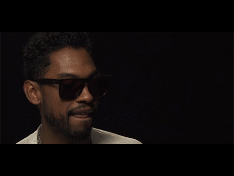 Miguel licking his lips.gif