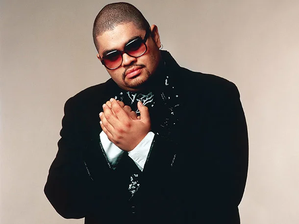 Heavy D with a shaved head looking hot.jpg