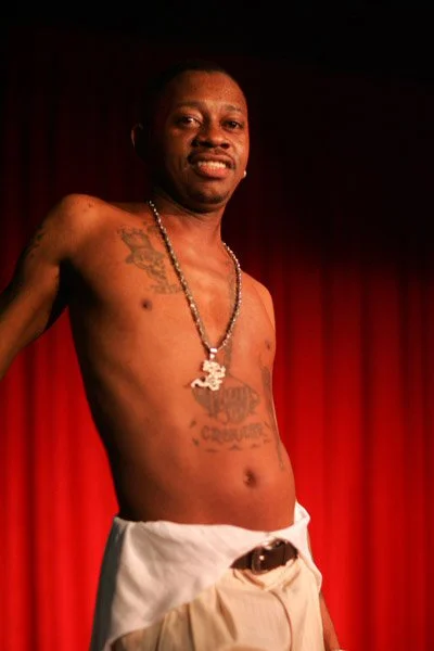 K-Ci Hailey with no shirt on looking extremely gorgeous on stage.jpg