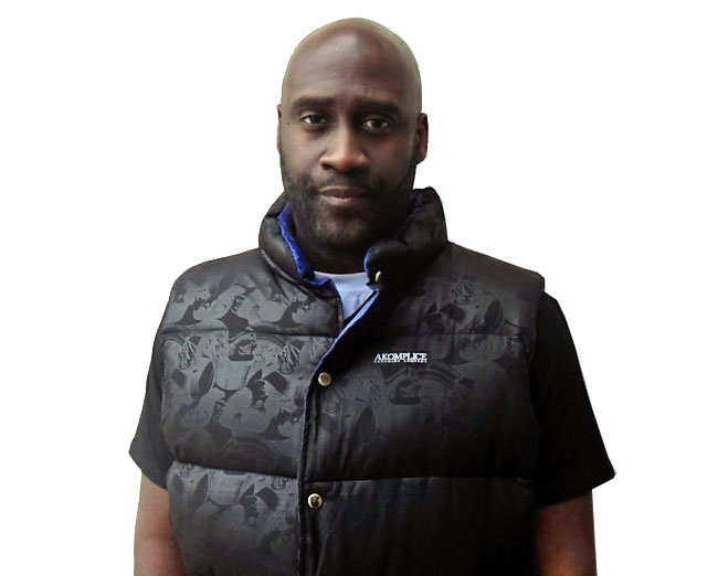 Plug 1 aka Posdnuos wearing a vest and looking hot.jpg