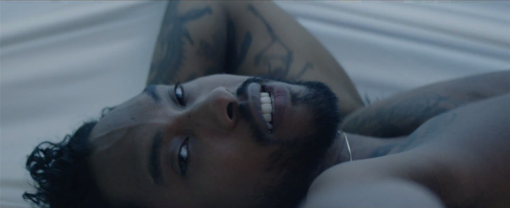 Miguel looking really hot naked in the bed in the Coffee video.jpg