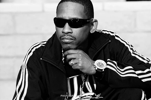 Kurupt wearing an ADIDAS track suit looking hot.jpg